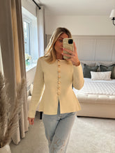 Load image into Gallery viewer, SOPHIE CREAM BUTTON PEPLUM CARDIGAN