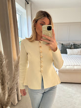 Load image into Gallery viewer, SOPHIE CREAM BUTTON PEPLUM CARDIGAN