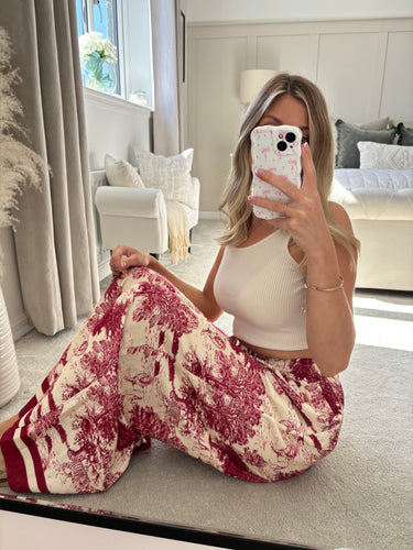 ISLA BURGUNDY SATIN JUNGLE PRINT TROUSERS
