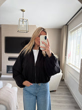 Load image into Gallery viewer, JULES BLACK BUBBLE HEM LIGHTWEIGHT JACKET