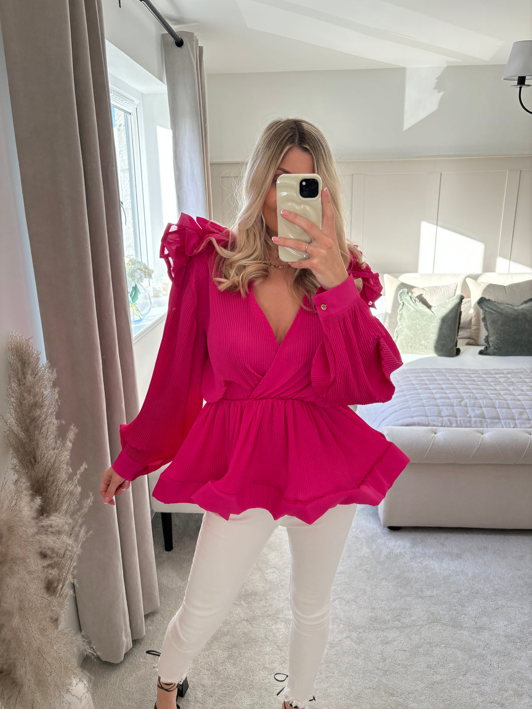 Pink ruffle top hotsell
