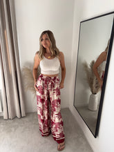 Load image into Gallery viewer, ISLA BURGUNDY SATIN JUNGLE PRINT TROUSERS