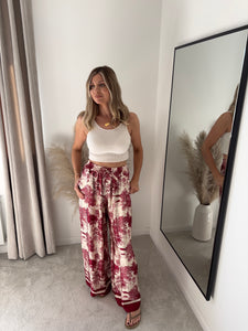 ISLA BURGUNDY SATIN JUNGLE PRINT TROUSERS
